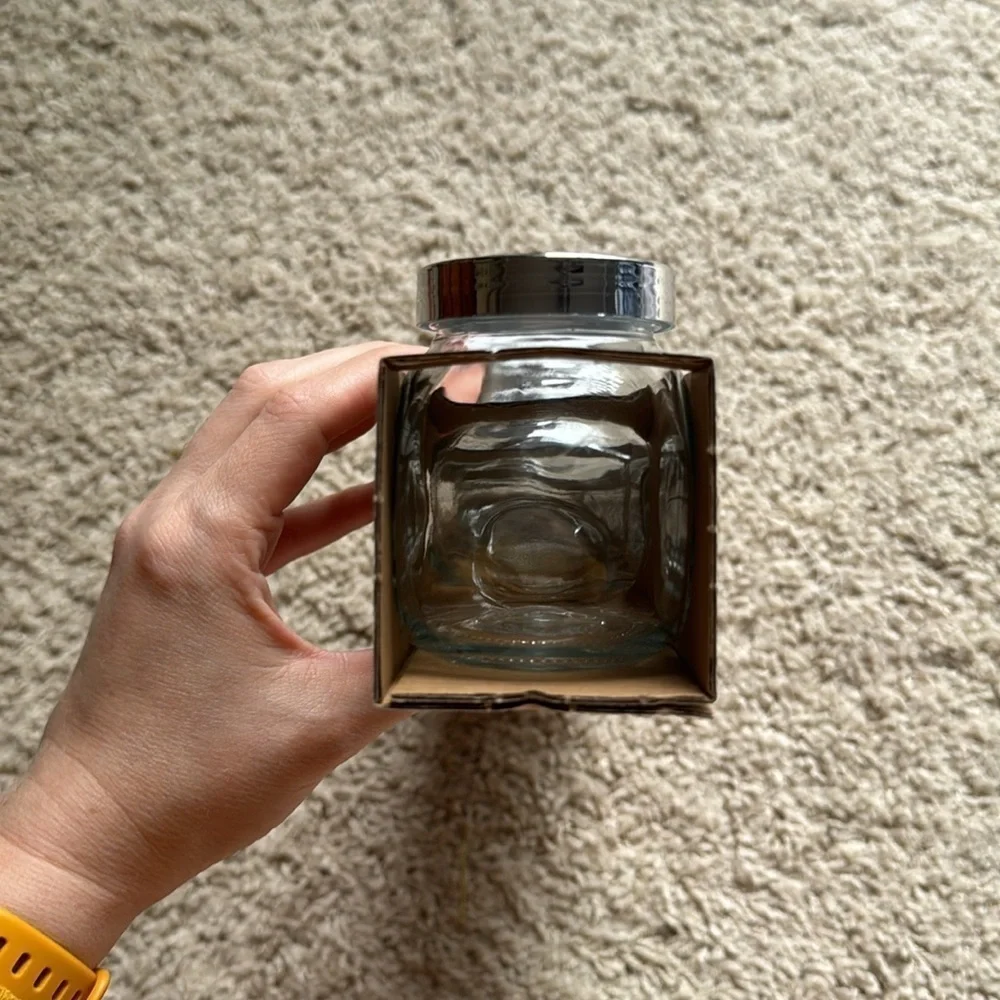 IKEA set of four Rajtan glass spice jars with silver lids